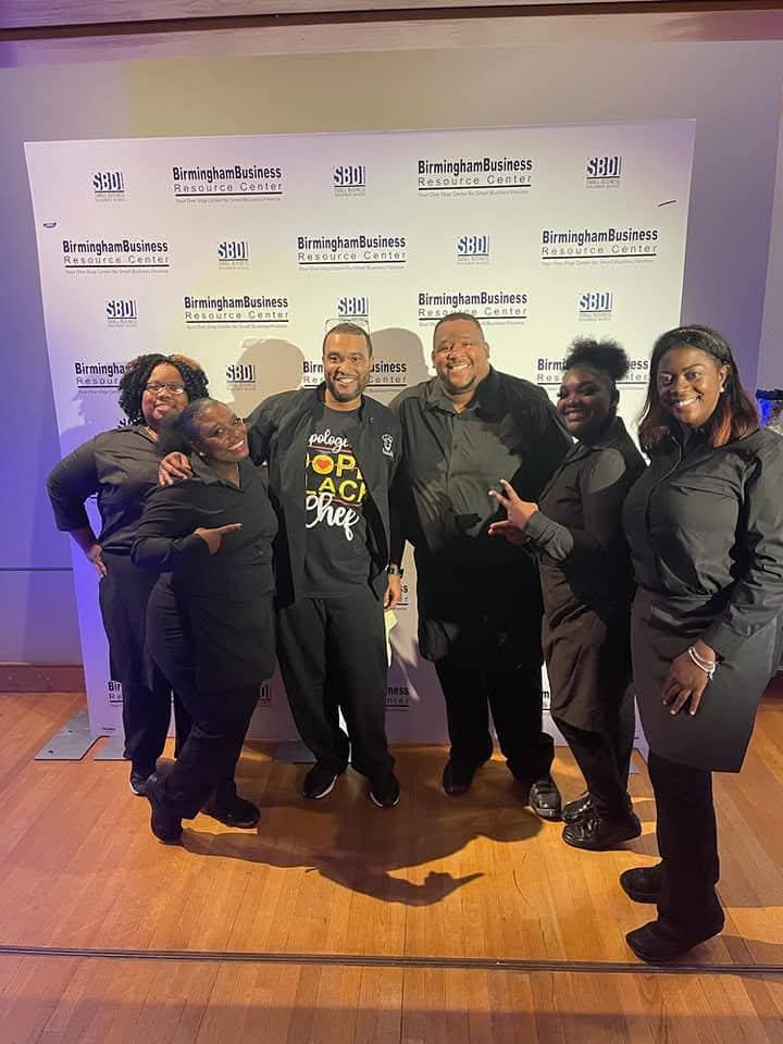 The full 2 Girlz and A Tray team staffing a corporate event